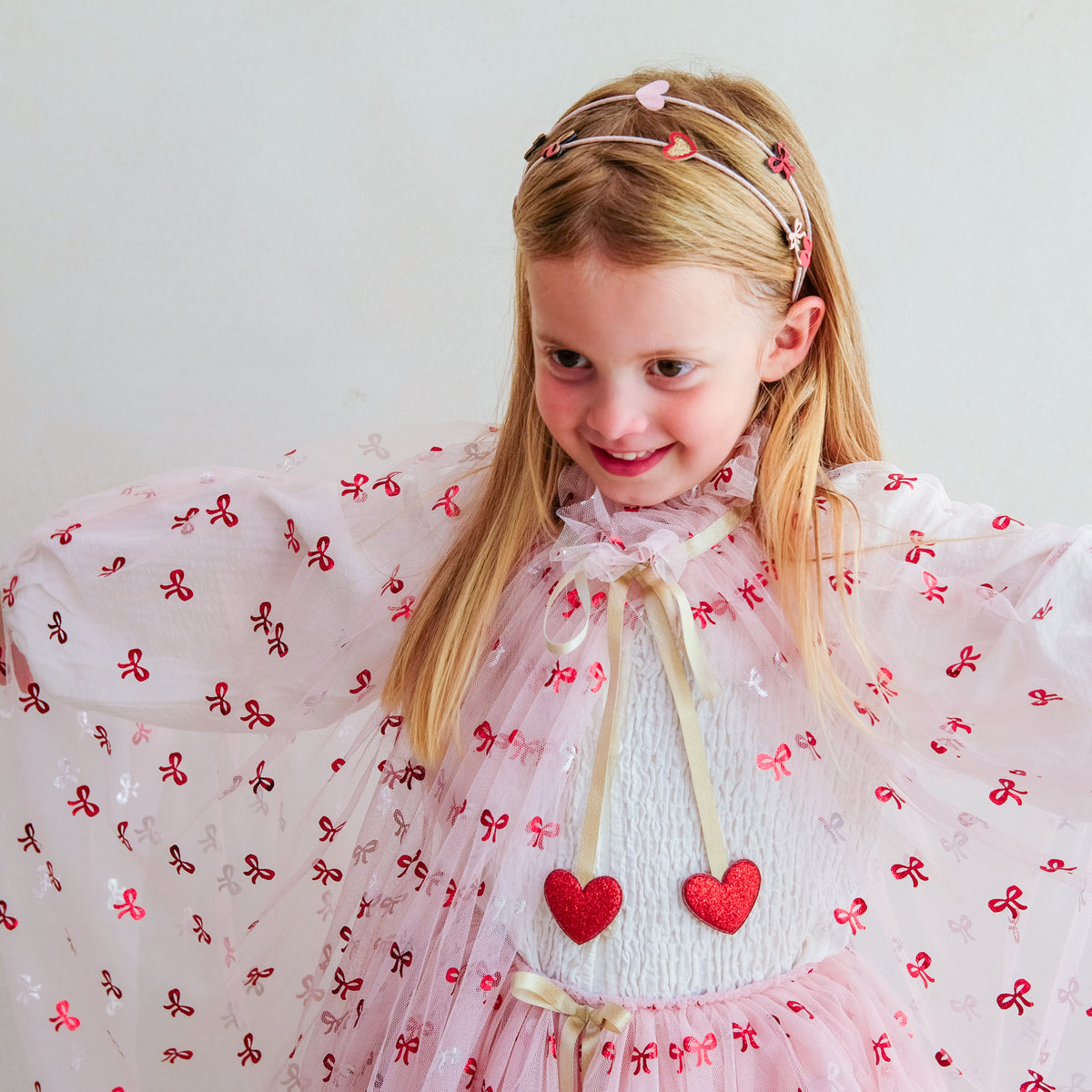 Cutesy Bow Print Cape