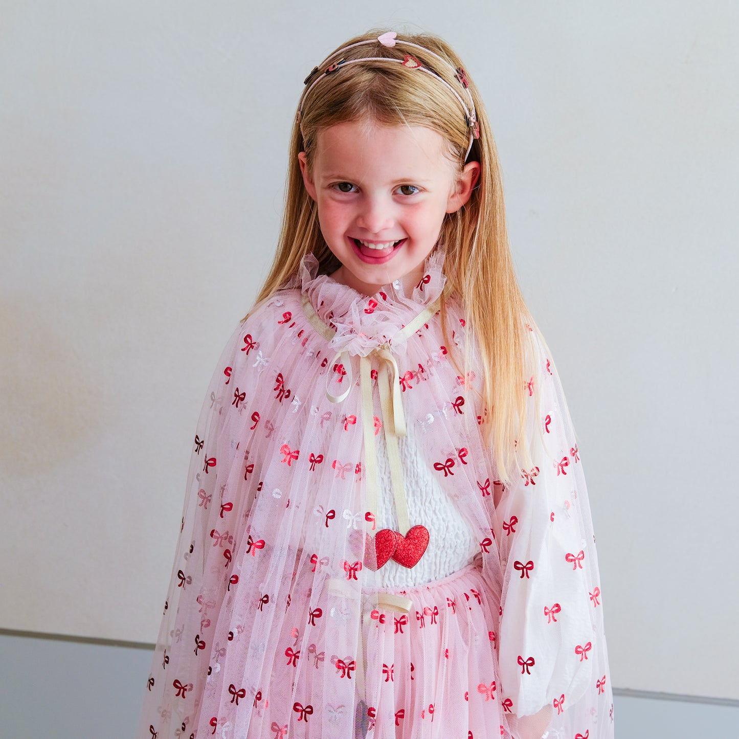 Cutesy Bow Print Cape