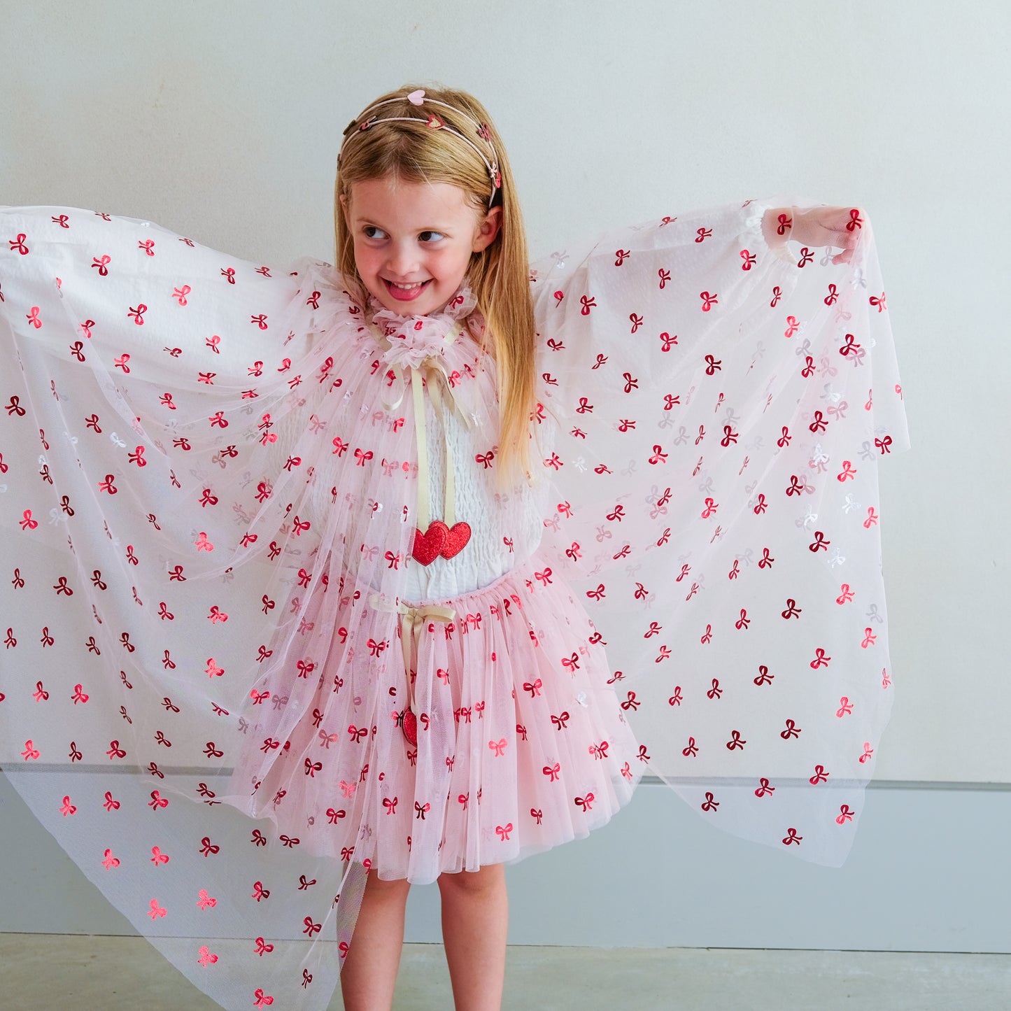Cutesy Bow Print Cape