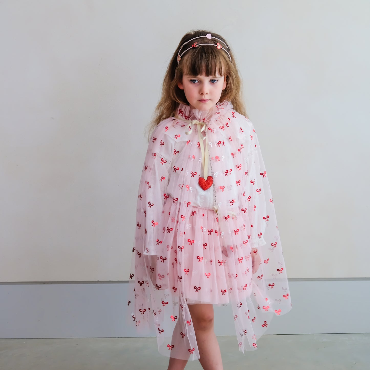 Cutesy Bow Print Cape