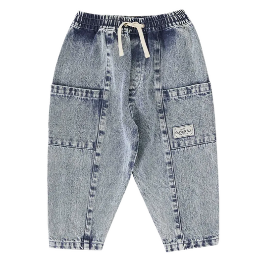 Blue denim jogger pants with a brand label on a white background LITTLE GENERAL KIDS