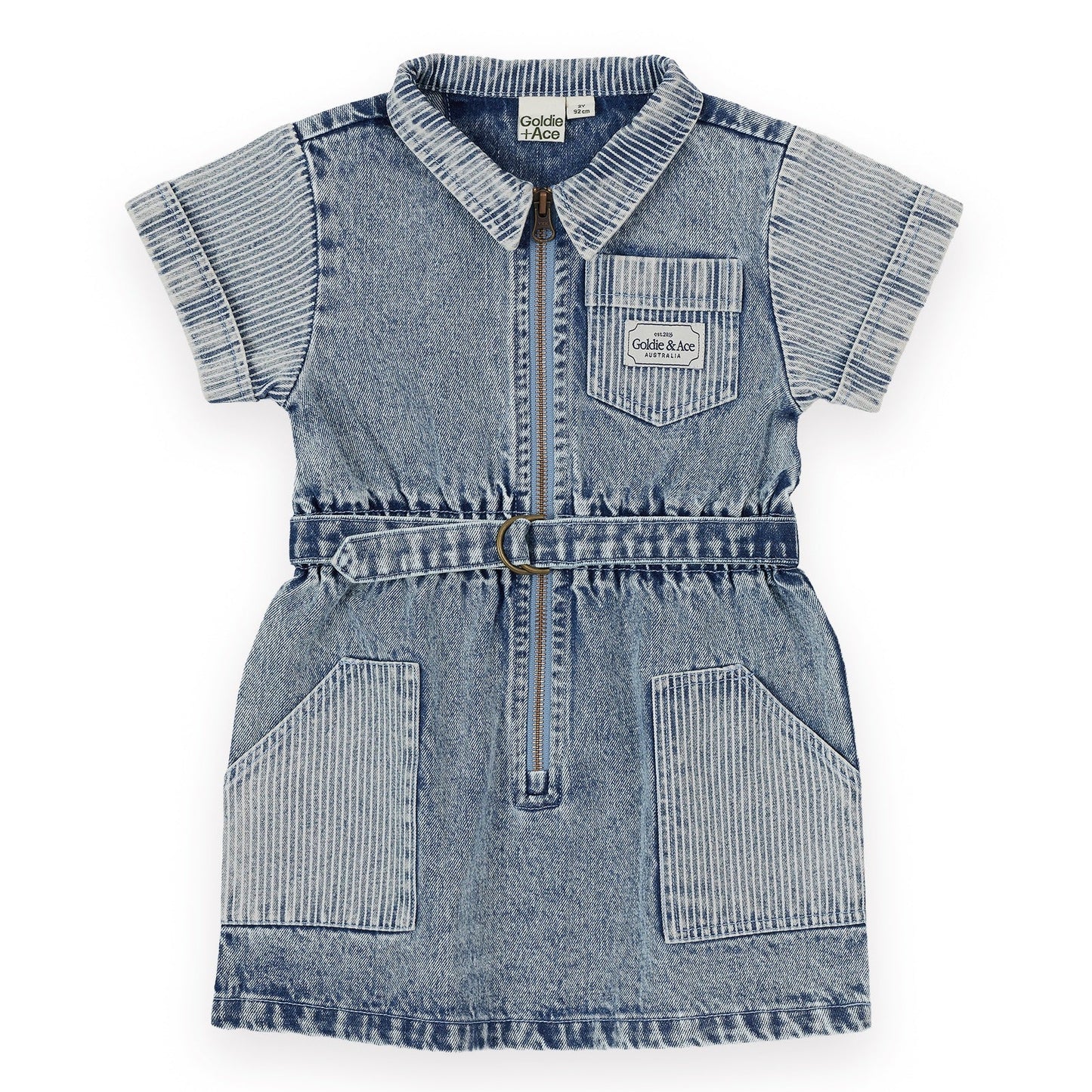 A children's denim dress with short striped sleeves, a pointed collar, a front zipper, a matching fabric tie belt, and two front patch pockets, shown on a plain white background. LITTLE GENERAL KIDS