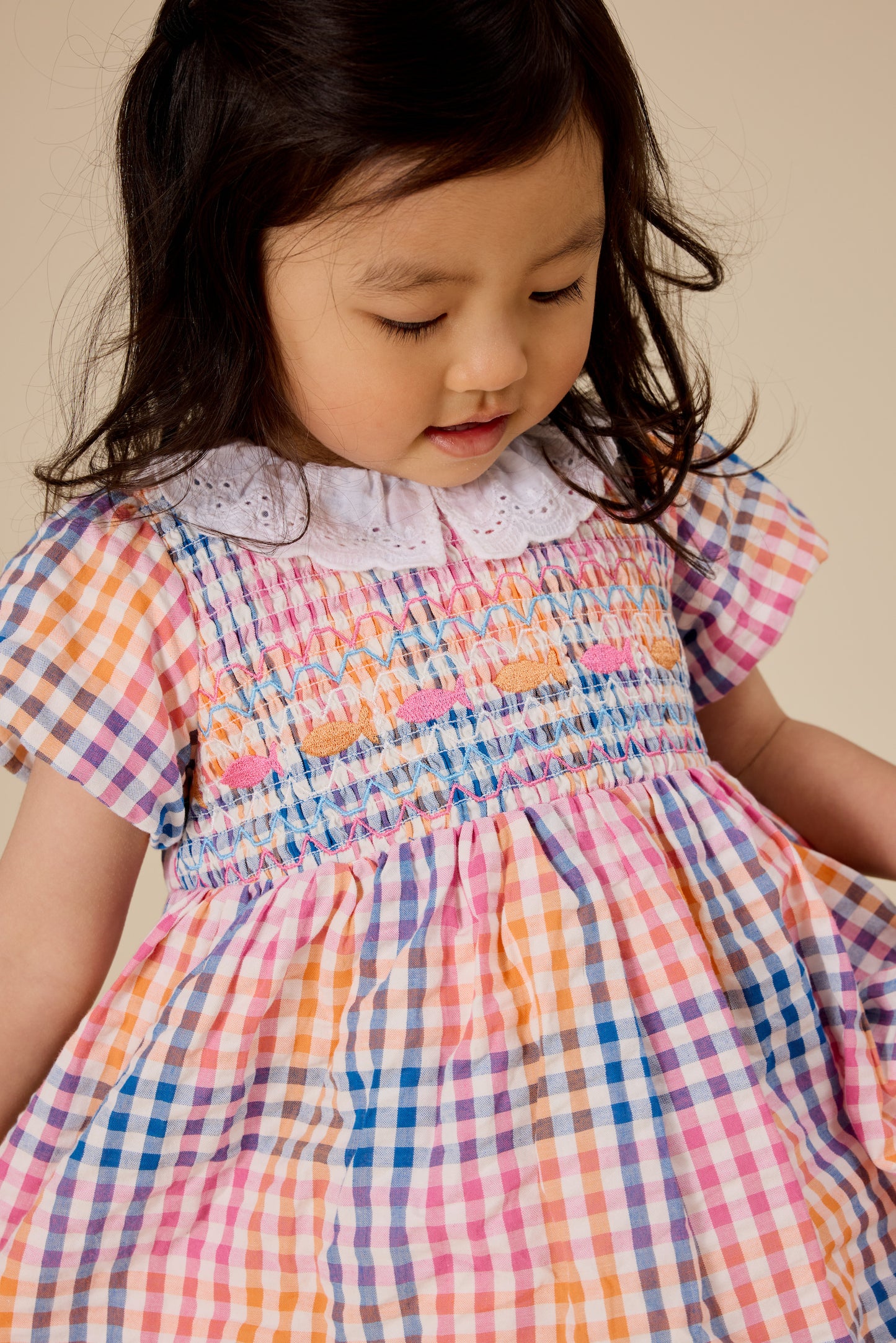 Flo Rainbow Gingham Smocked Dress
